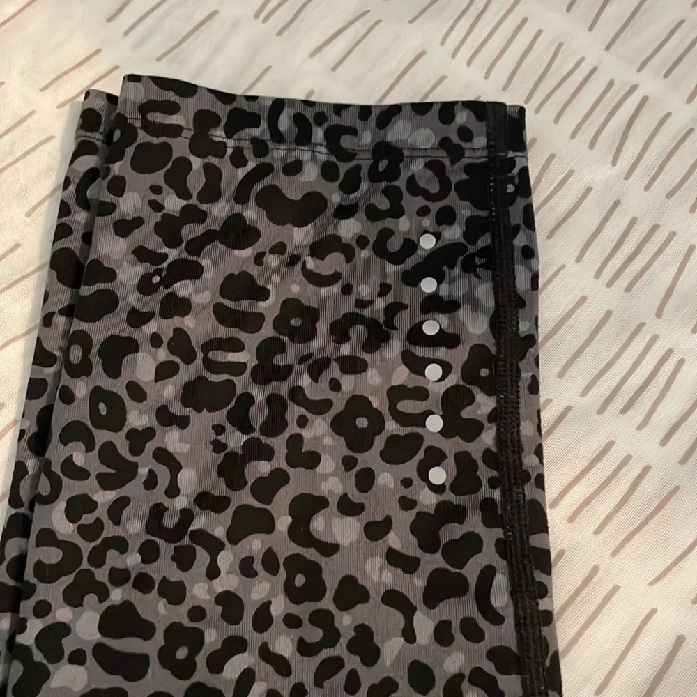 Nike dri fit gray and black leopard print capri leggings with back pocket